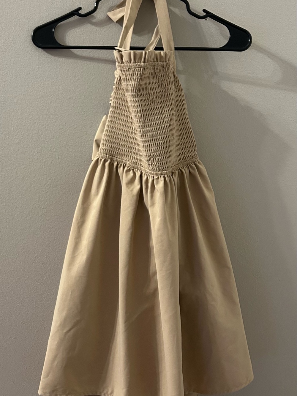 NWT. Boutique Tan Halter Bodice Mini Dress with Open Back and Tie Bow